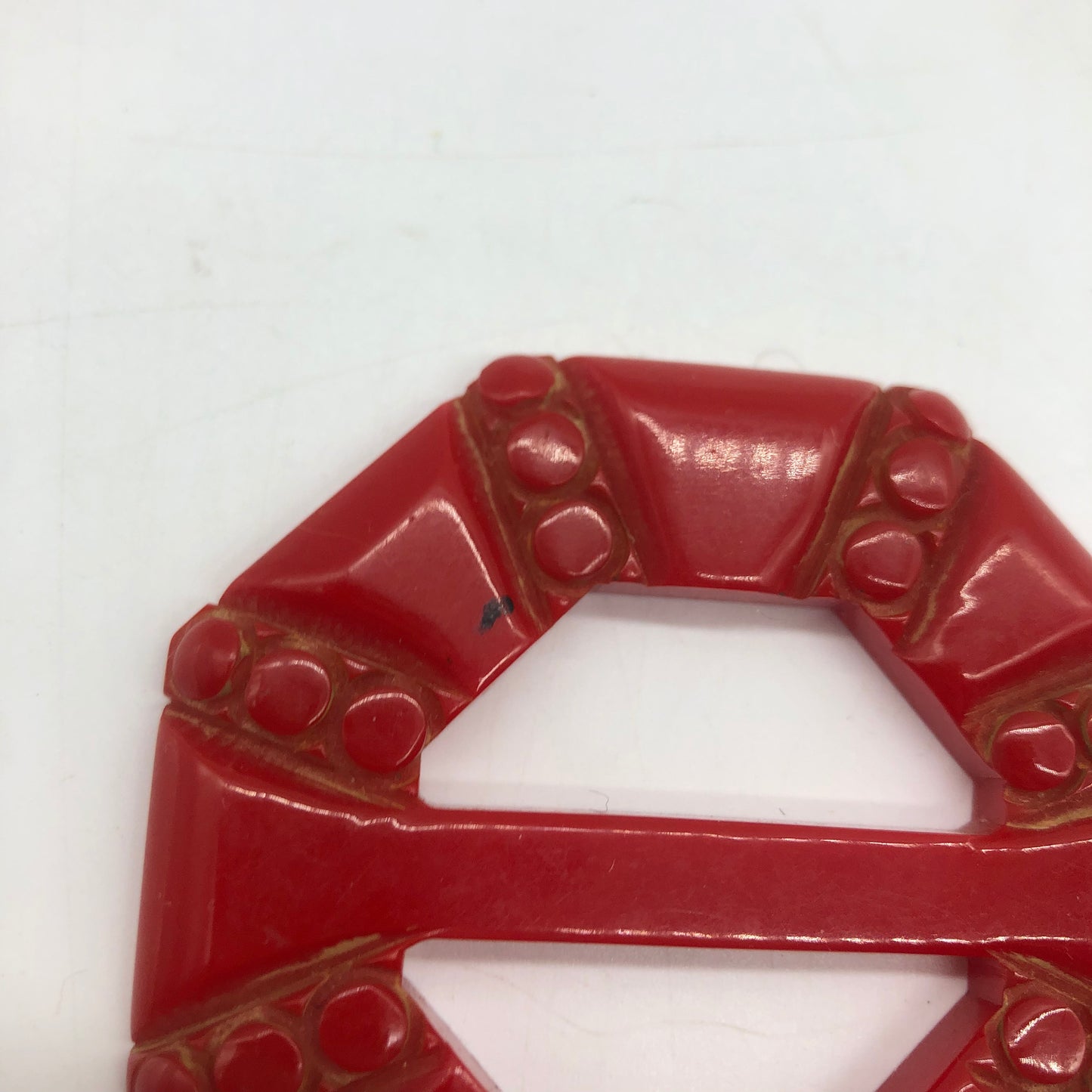 Red Carved Bakelite Buckle Scarf Holder